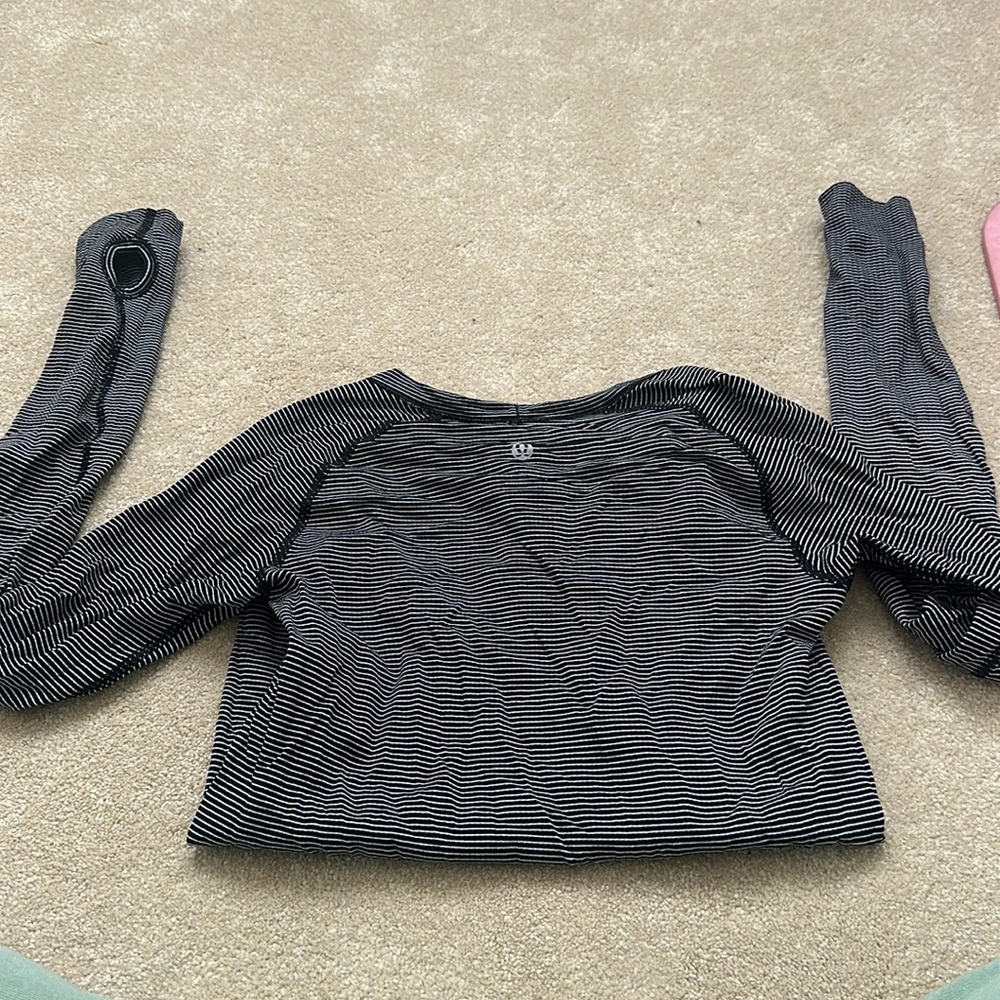 Swiftly Tech Long-Sleeve Shirt 2.0
Waist Length